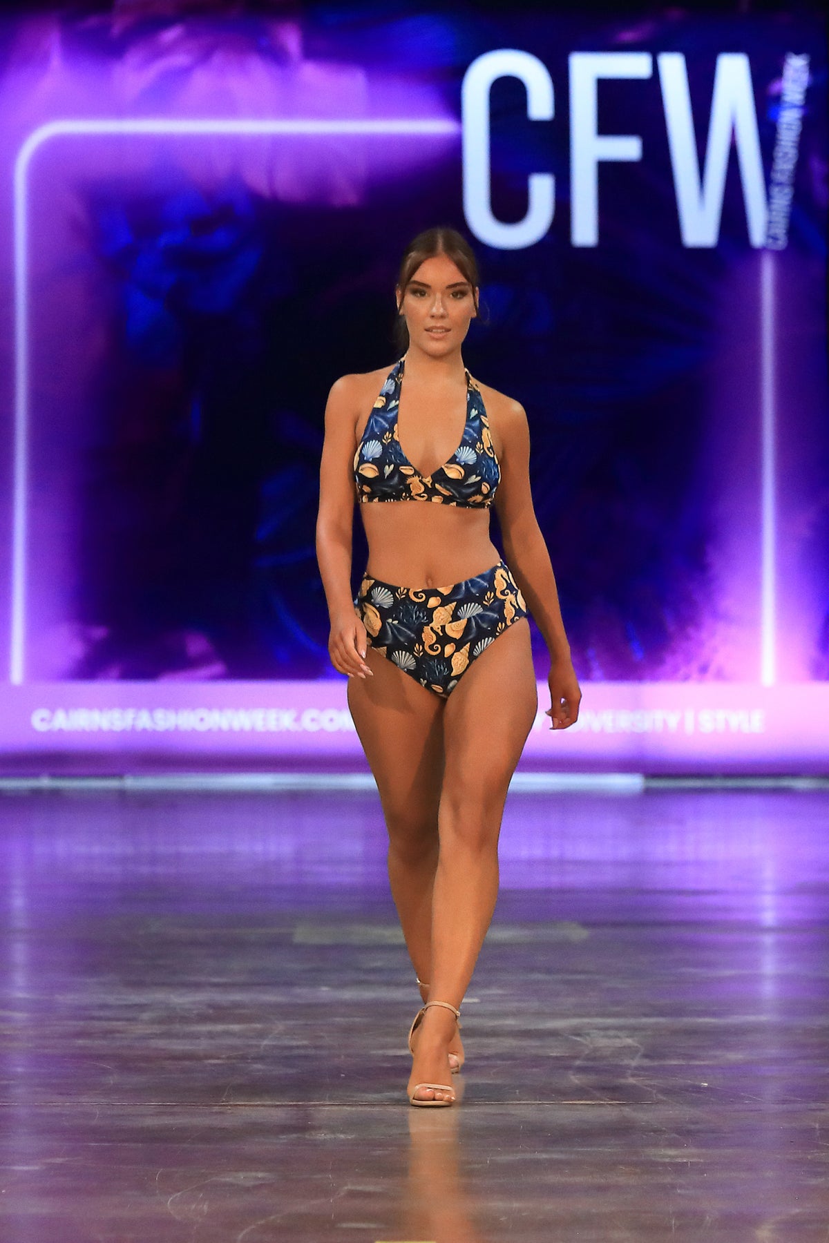 Model walks the runway in the Čiovo navy seashell print bikini set