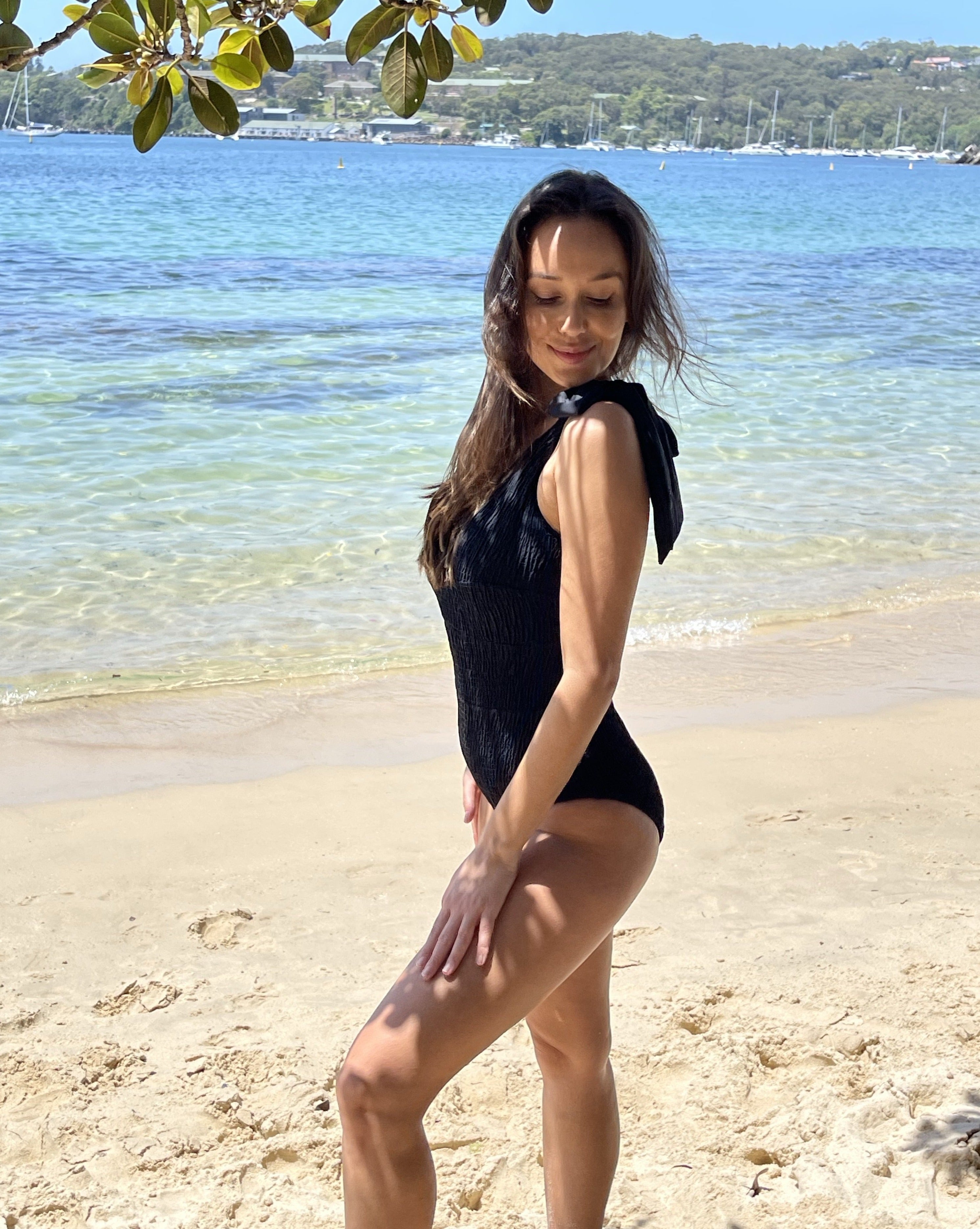 Black one shoulder textured one piece swimsuit designed in Australia by Plivati Swimwear.