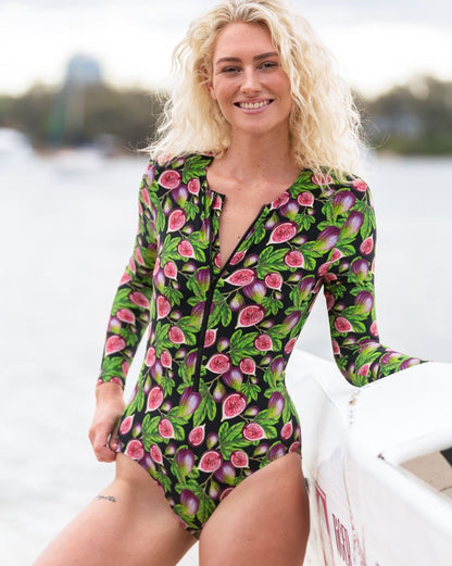 One piece long sleeve swimsuit with open back, front zip and neck tie in the Plivati FIGS print.